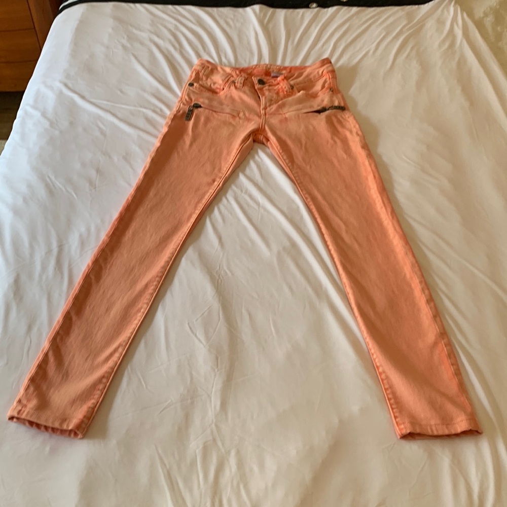 Parasuco women’s orange/pink jeans.